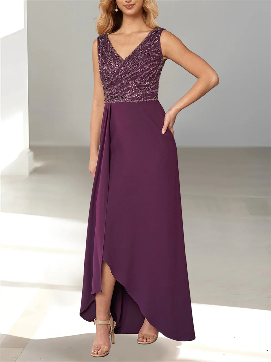 Woman wearing an elegant A-line V-neck maxi dress.