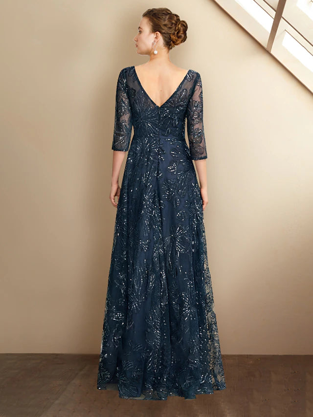 Close-up of the sequin and lace appliques on the 3/4 length sleeve of the Mother of the Bride gown.