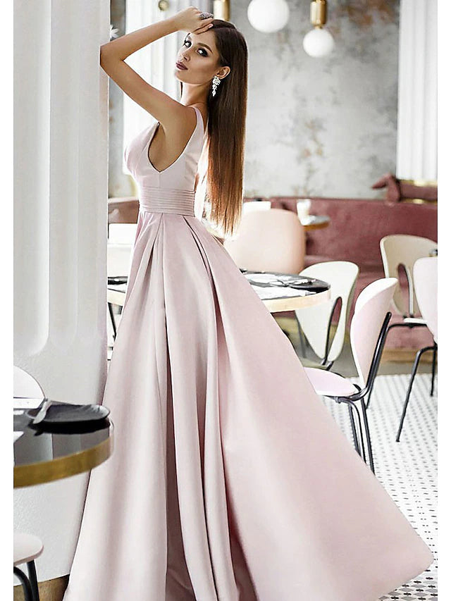 Front view of pleated navy satin formal dress with A-line silhouette.
