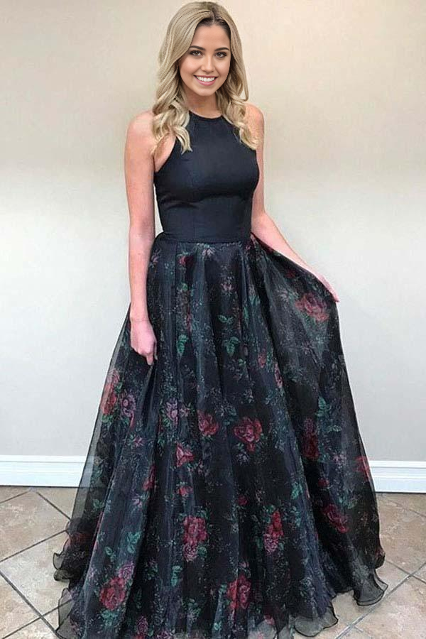 Elegant black A-line tulle prom dress with open back and sweep train.