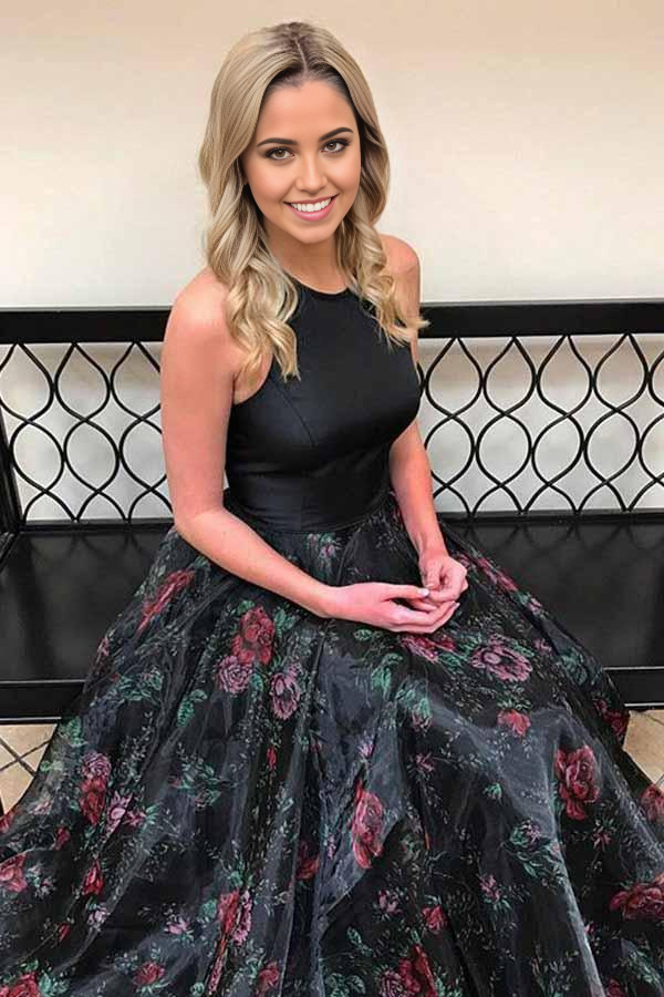 Side view of black sleeveless A-line prom dress.