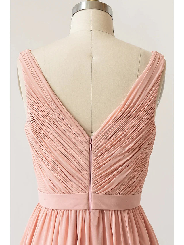 Back view of a sleeveless A-line bridesmaid dress showing open back.