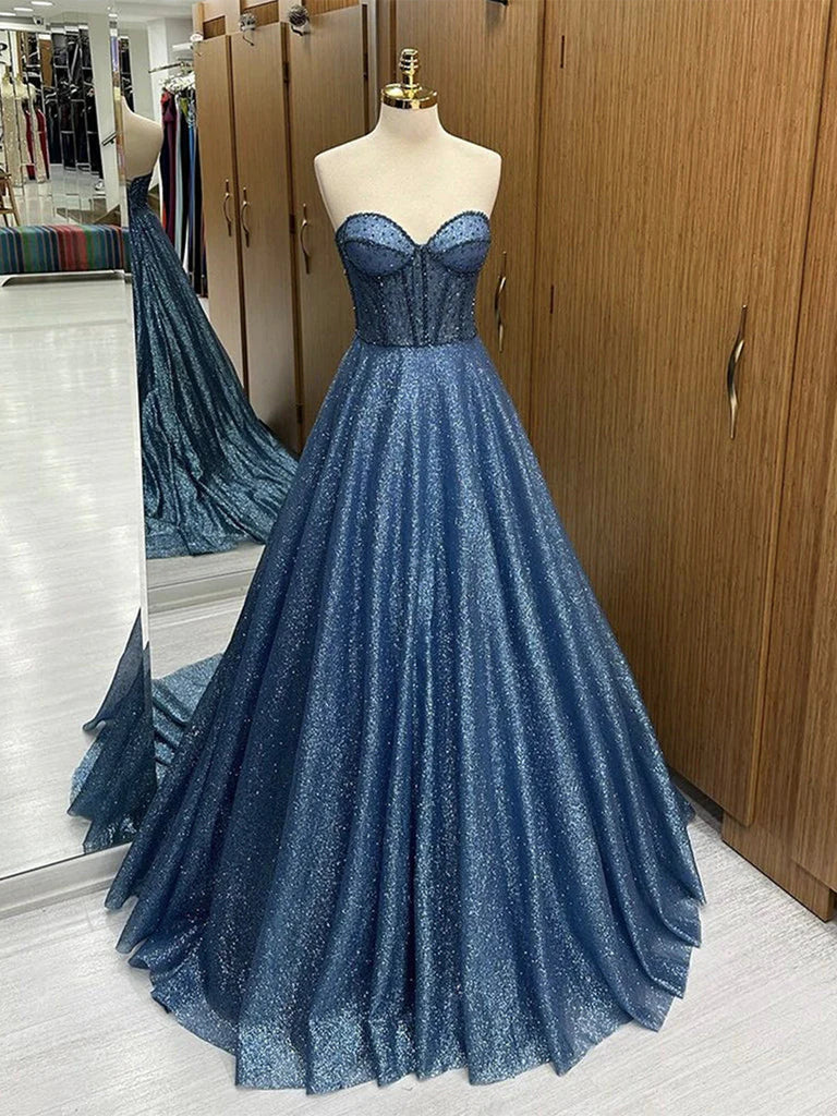 Model wearing an elegant A-line V-neck lace long prom dress.