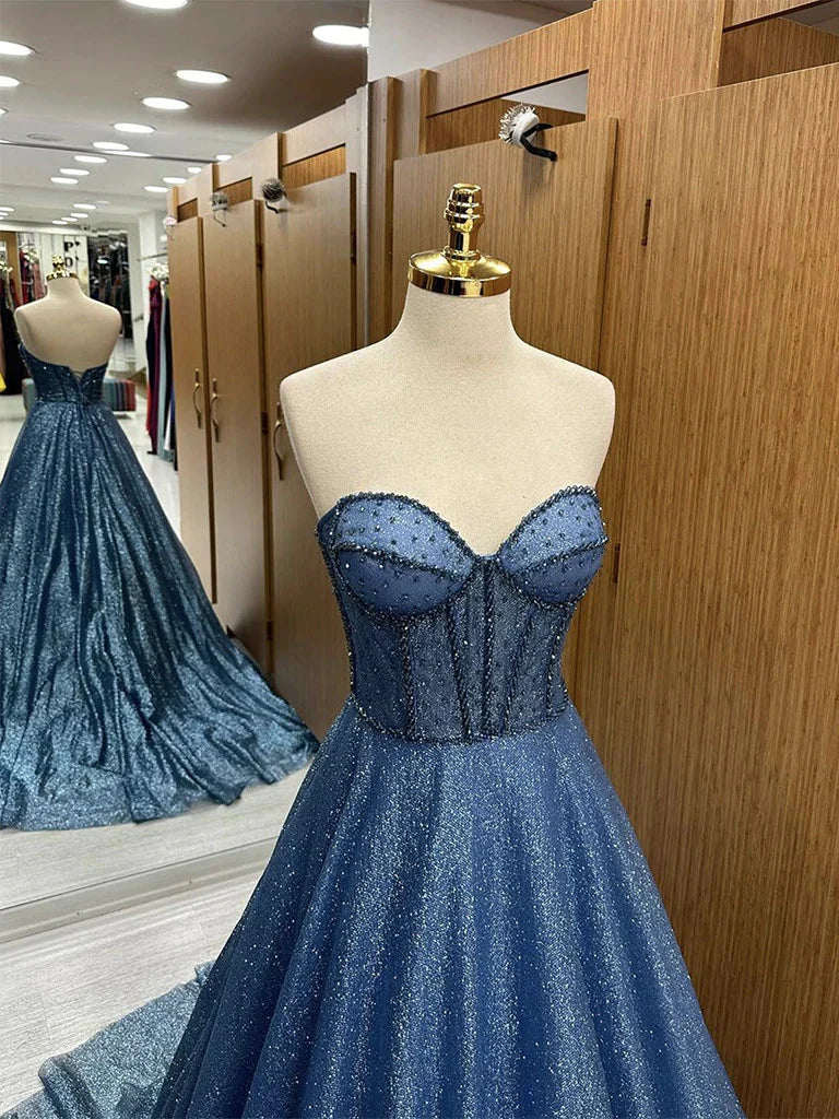 Back view of the A-line V-neck lace long prom dress with open back detail.