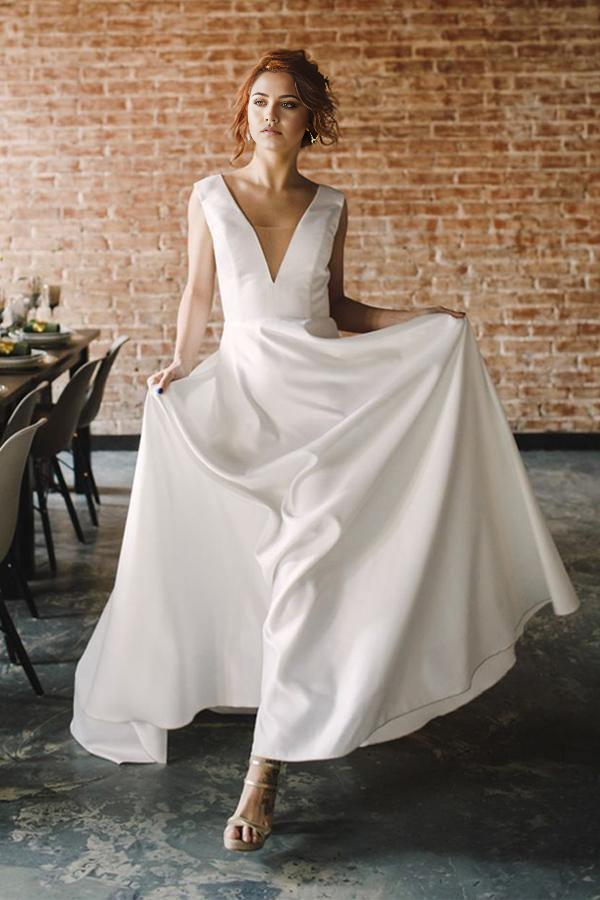 A-line V-neck satin wedding dress with open back.