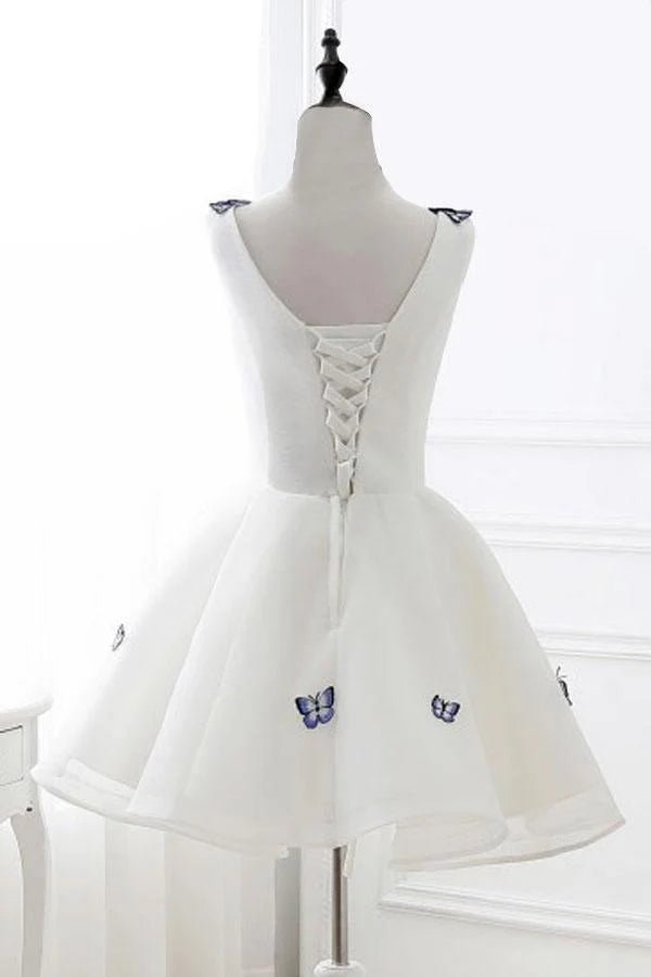 Close-up of delicate organza appliques on the dress.