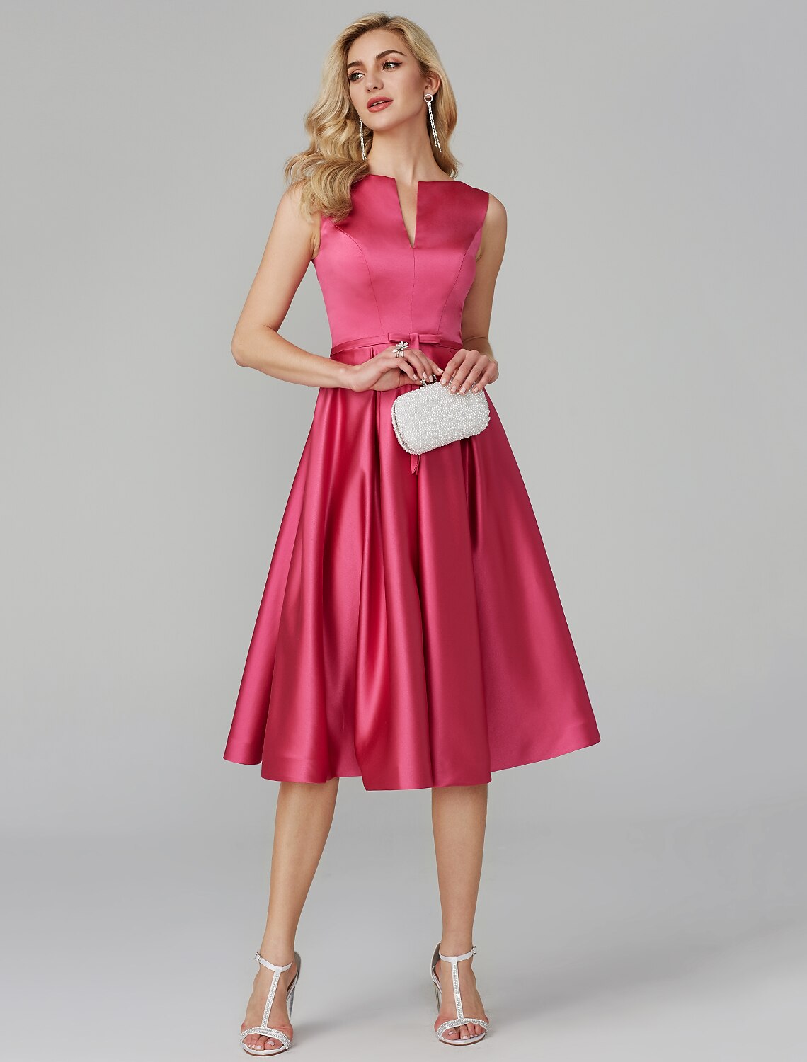 Pink satin A-line dress, close-up of V-neckline.