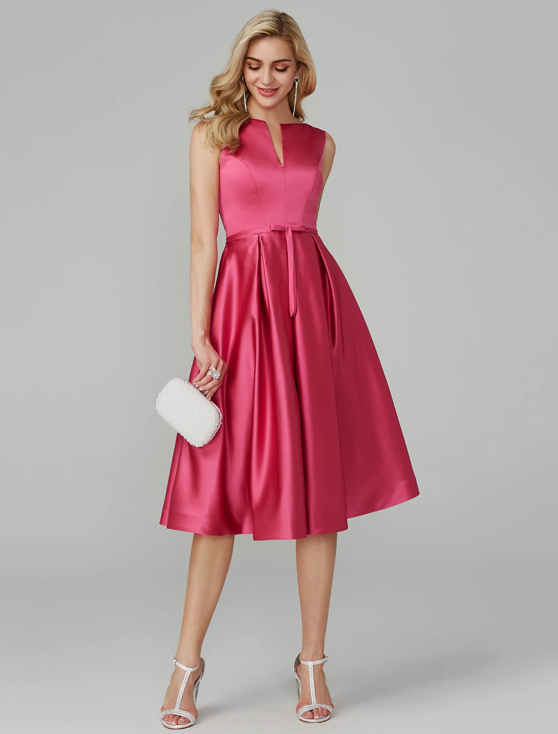 Full view of pink satin A-line party dress.