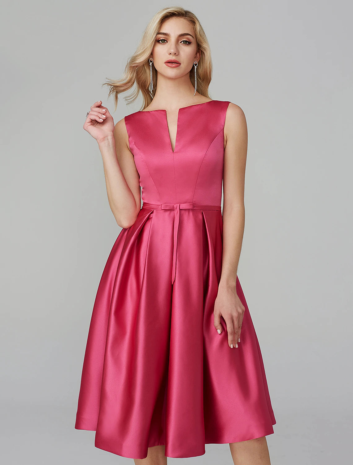 Pink satin dress with flowing A-line skirt.