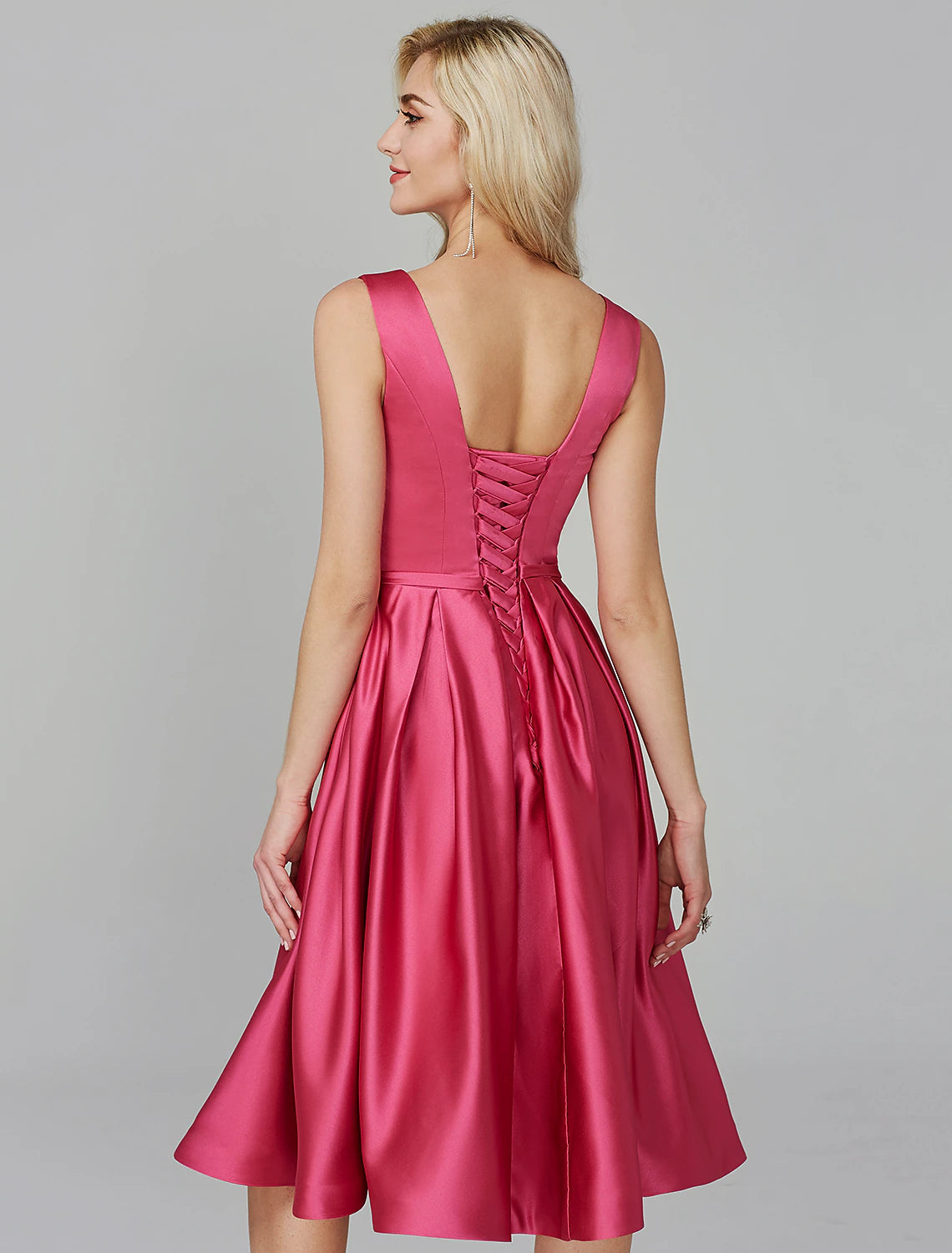 Detail of sash on pink satin A-line dress.