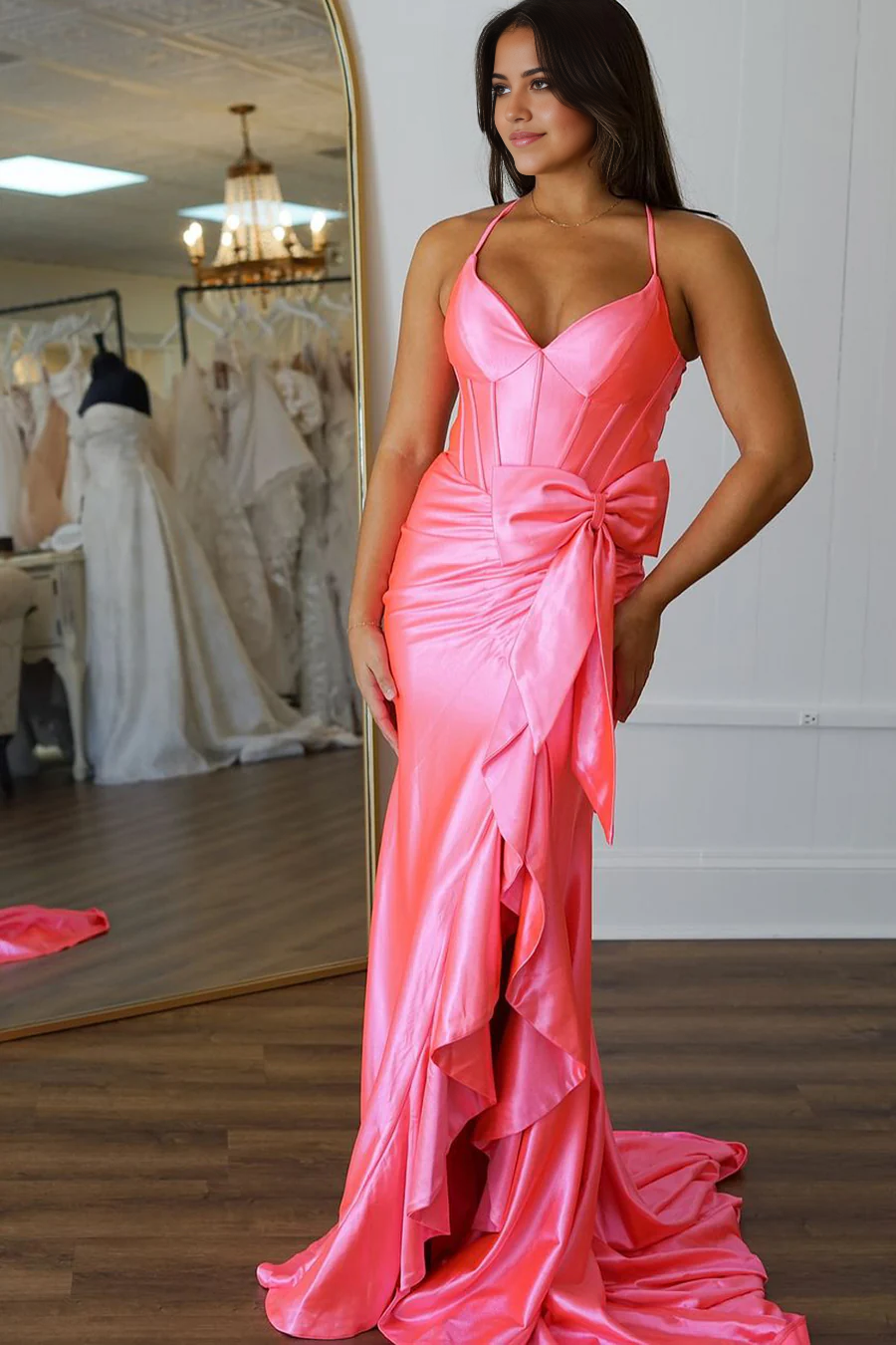 Elegant pink satin A-line V-neck long formal dress with a bow detail.