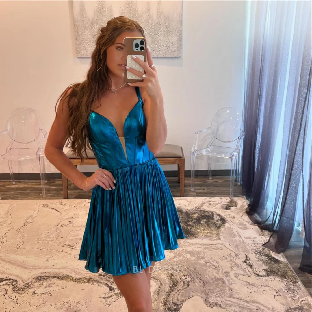 Blue A-line V-neck pleated short dress, side view.