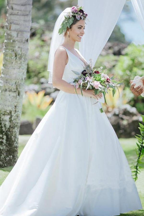 Full view of an elegant A-line V-neck satin wedding dress.