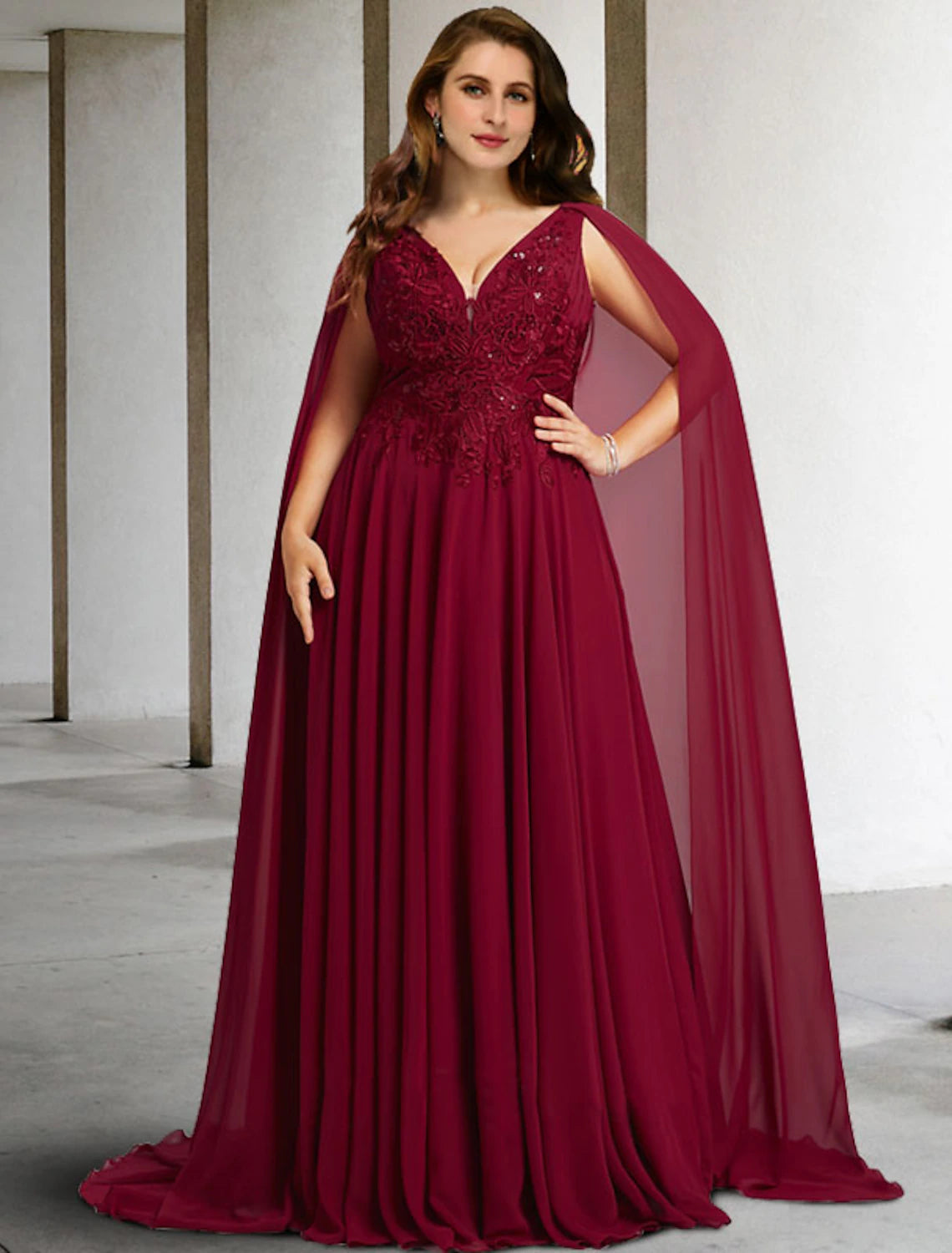 Elegant A-line V-neck plus size Mother of the Bride dress with lace and beading.