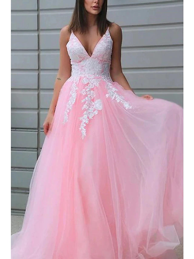 Close-up of the delicate appliques on the V-neck prom dress.