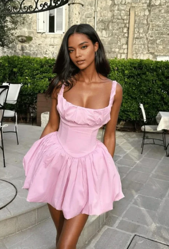 Elegant A-line V-neck homecoming dress with spaghetti straps and ruched details.