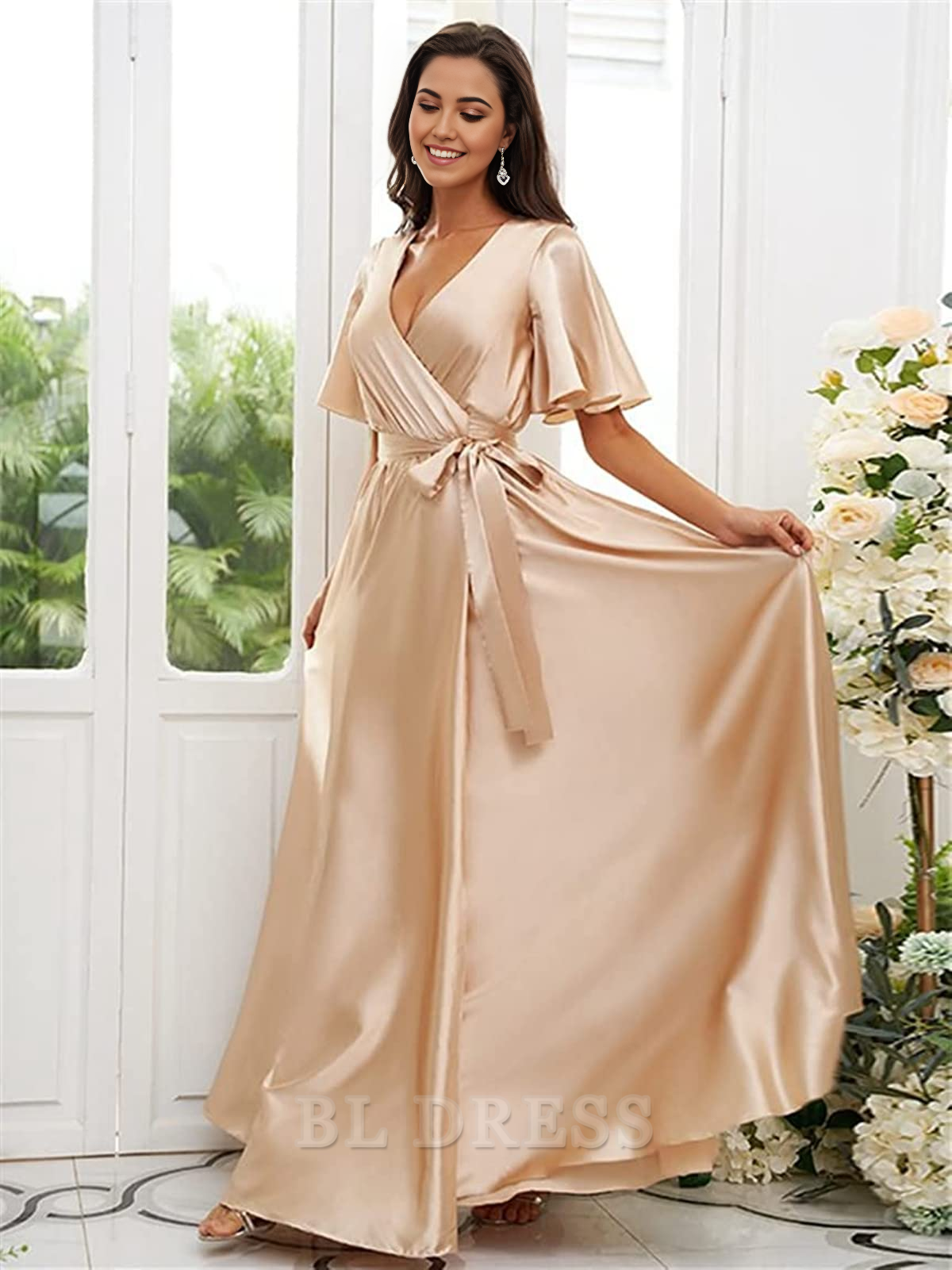 Full length view of the A-line V-neck satin evening gown.
