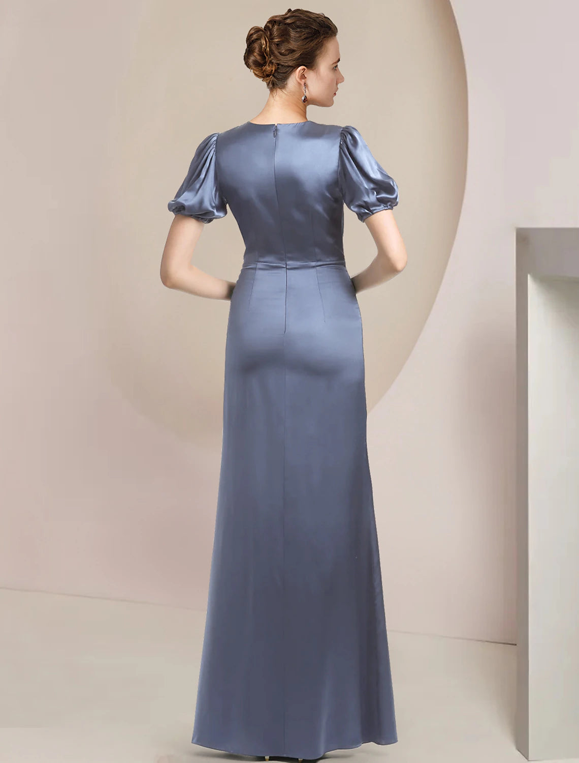 Back view of the A-Line satin formal dress, showcasing the sweep train and ruffle details.