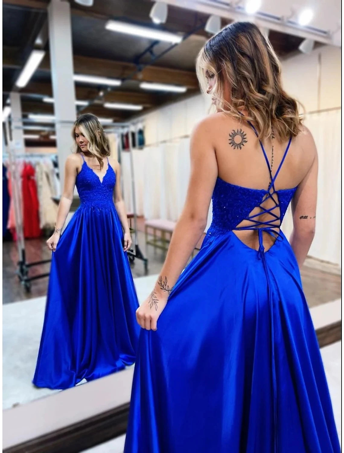 Side profile of the A-Line empire waist dress with court train.