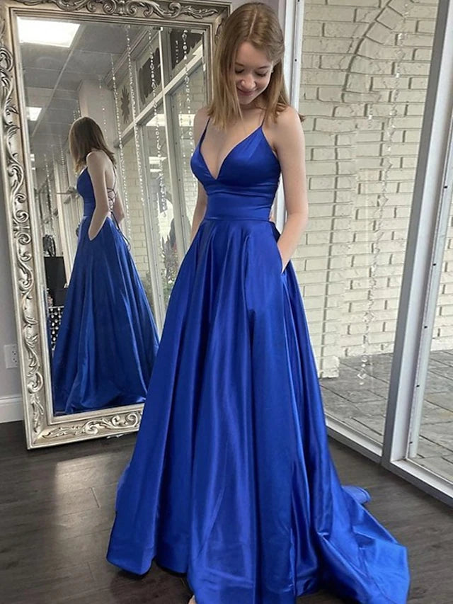 Elegant A-Line V-neck satin prom dress with pockets and a sweep train.