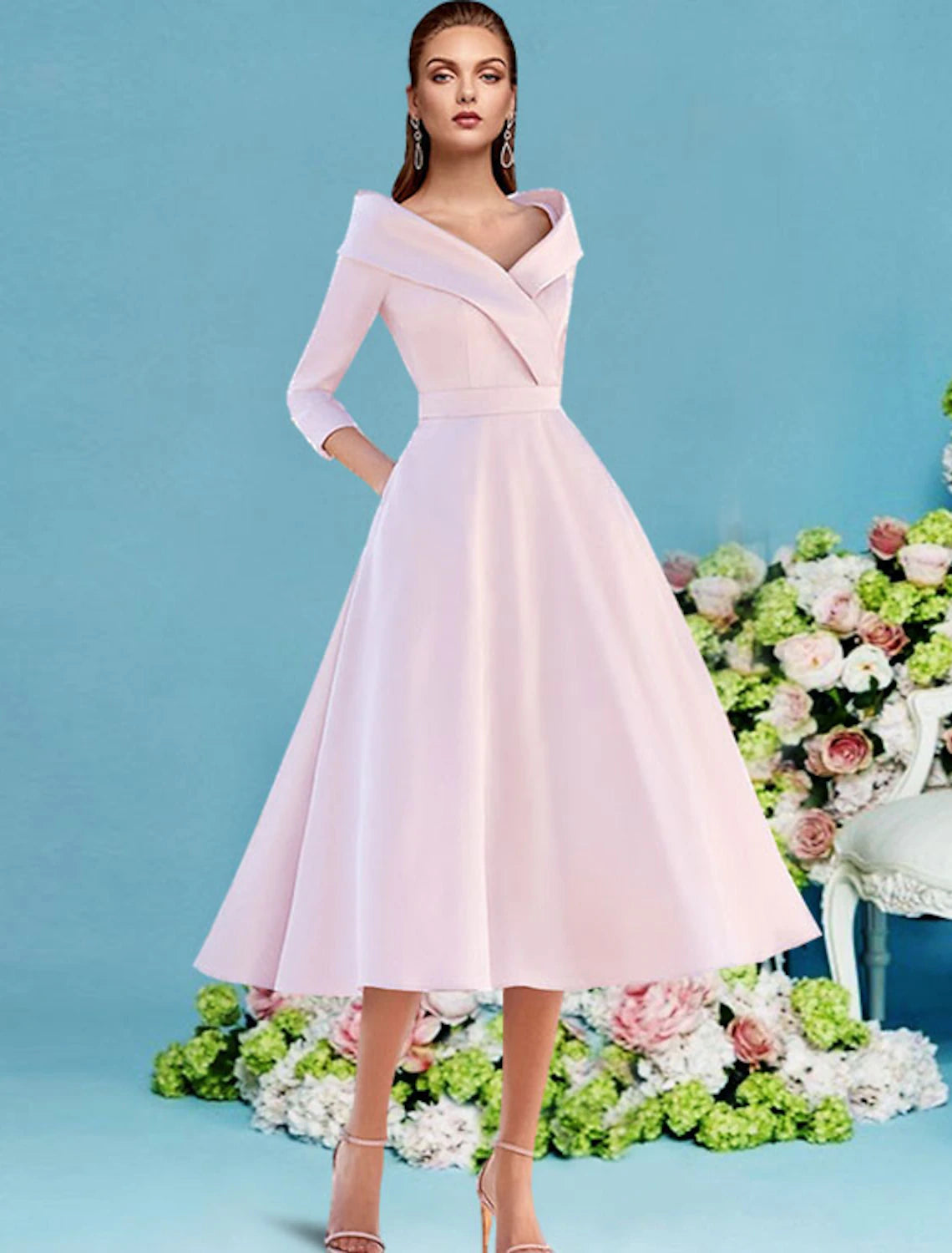 Elegant A-line V-neck satin tea length dress with 3/4 sleeves and pleats.