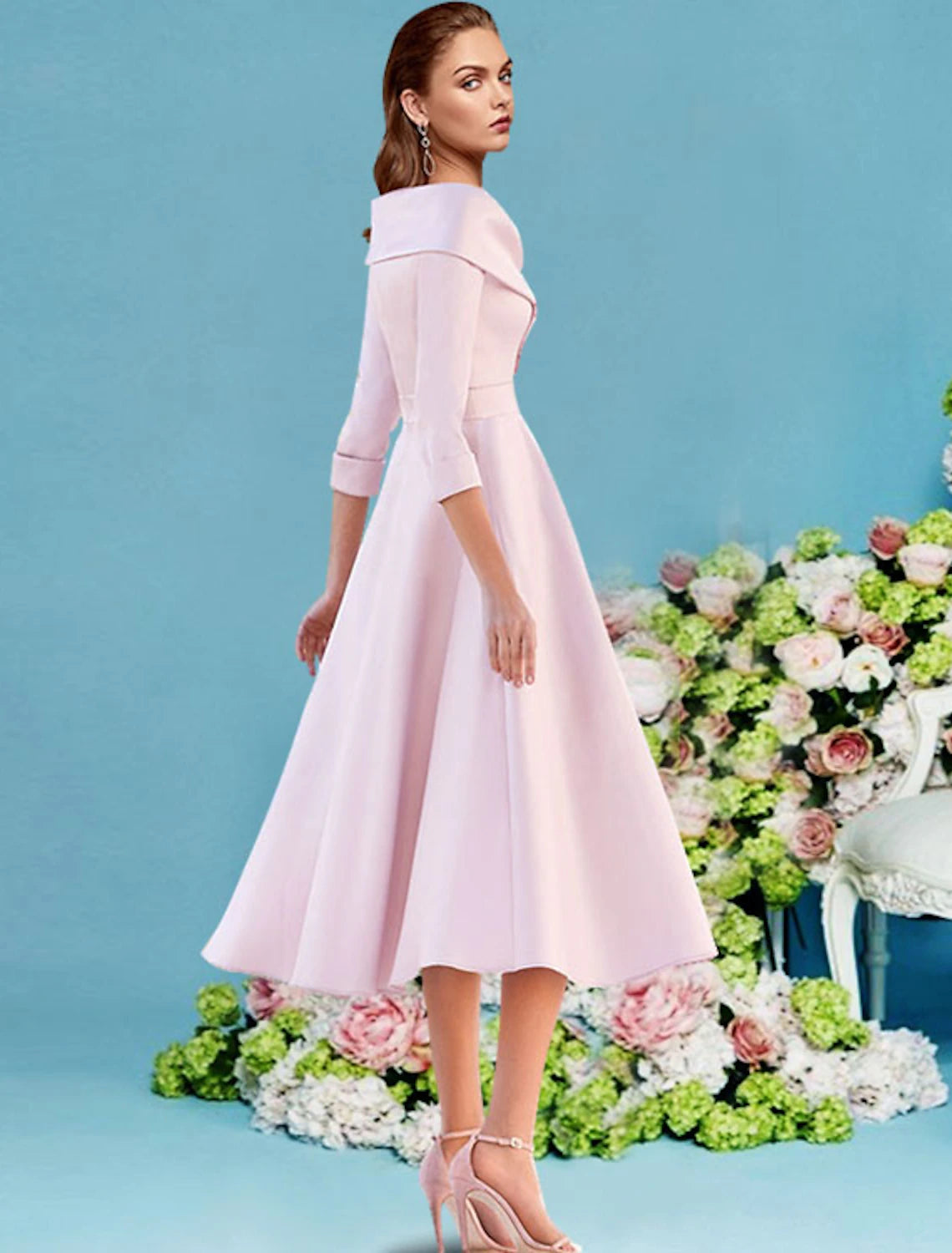 Side view of the A-line V-neck satin tea length dress.