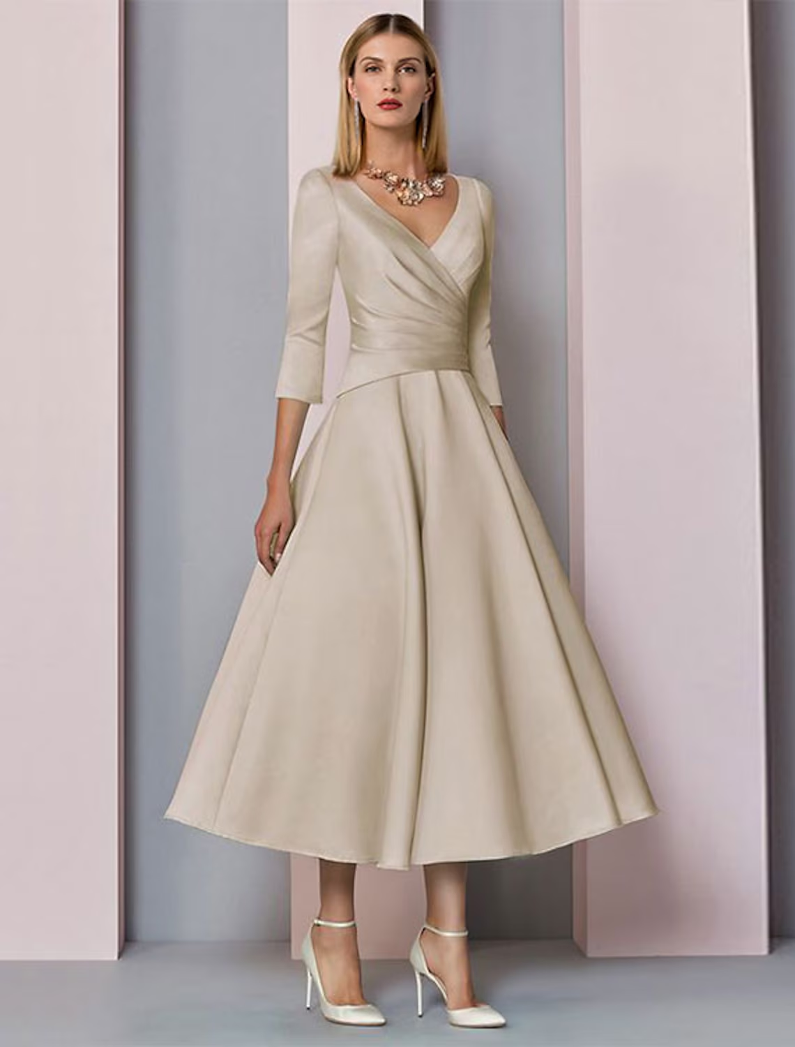Elegant A-Line V-neck satin tea length dress with 3/4 sleeves.