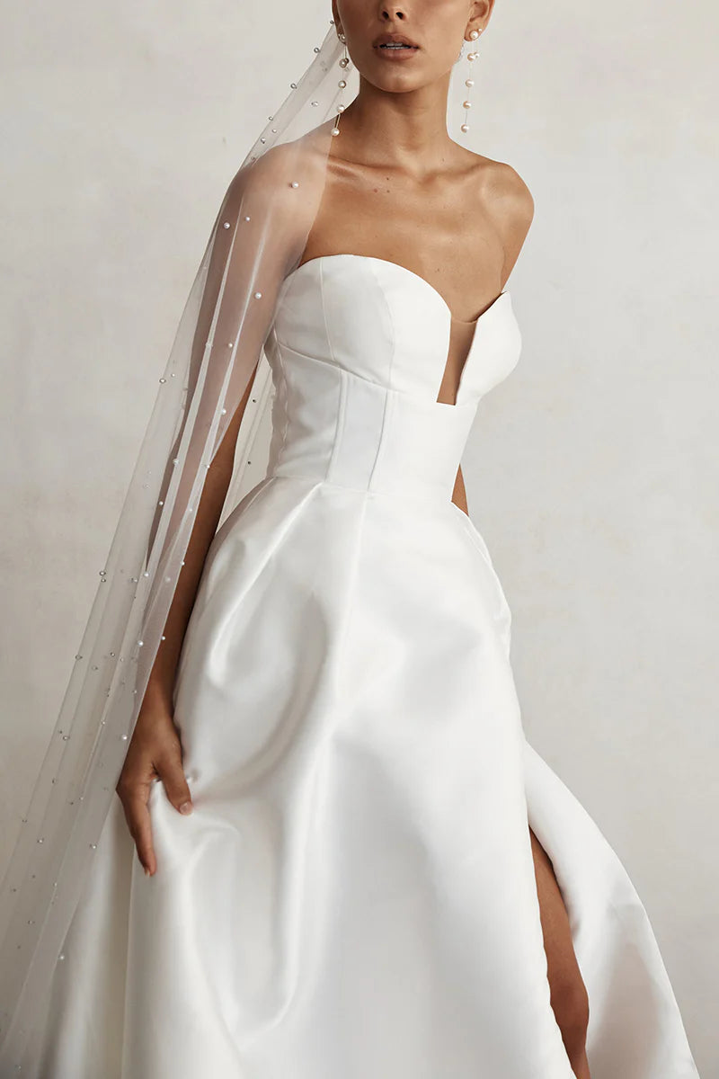 Elegant A-line satin wedding dress, V-neck design.