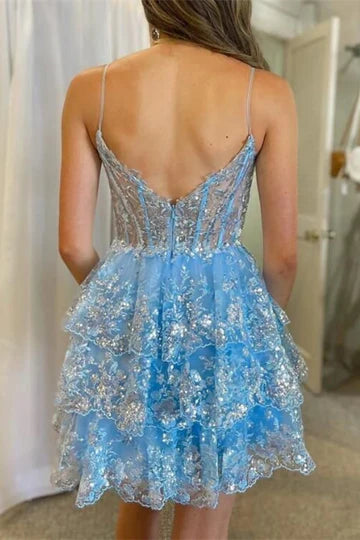 Close-up of an A-line sequin lace corset tiered homecoming dress.
