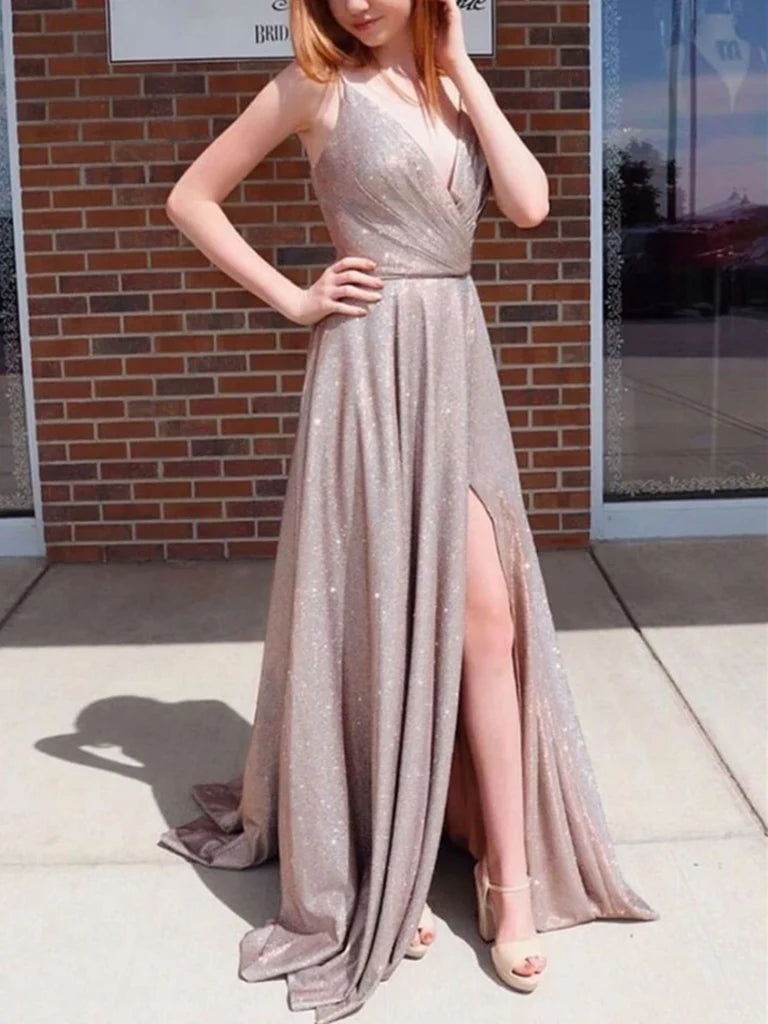 Woman wearing a V-neck sequin satin A-line long prom dress.
