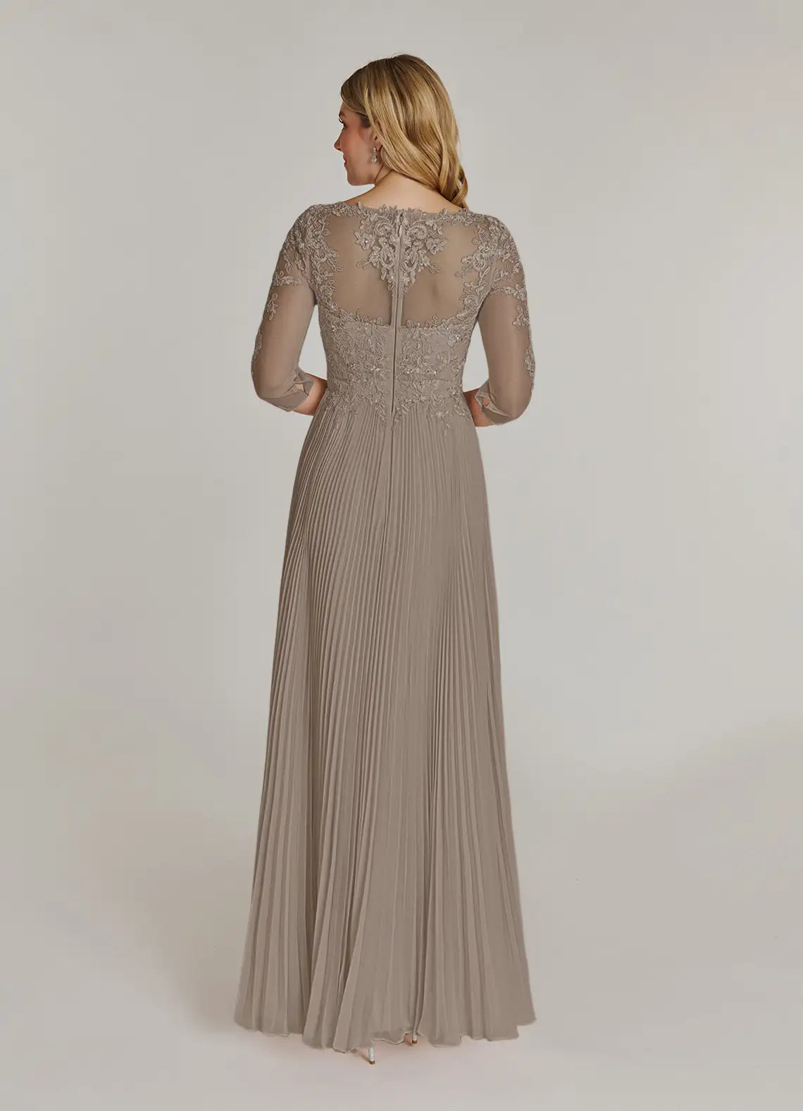 Side view of the taupe A-line sequined chiffon dress, showcasing its flowing silhouette.