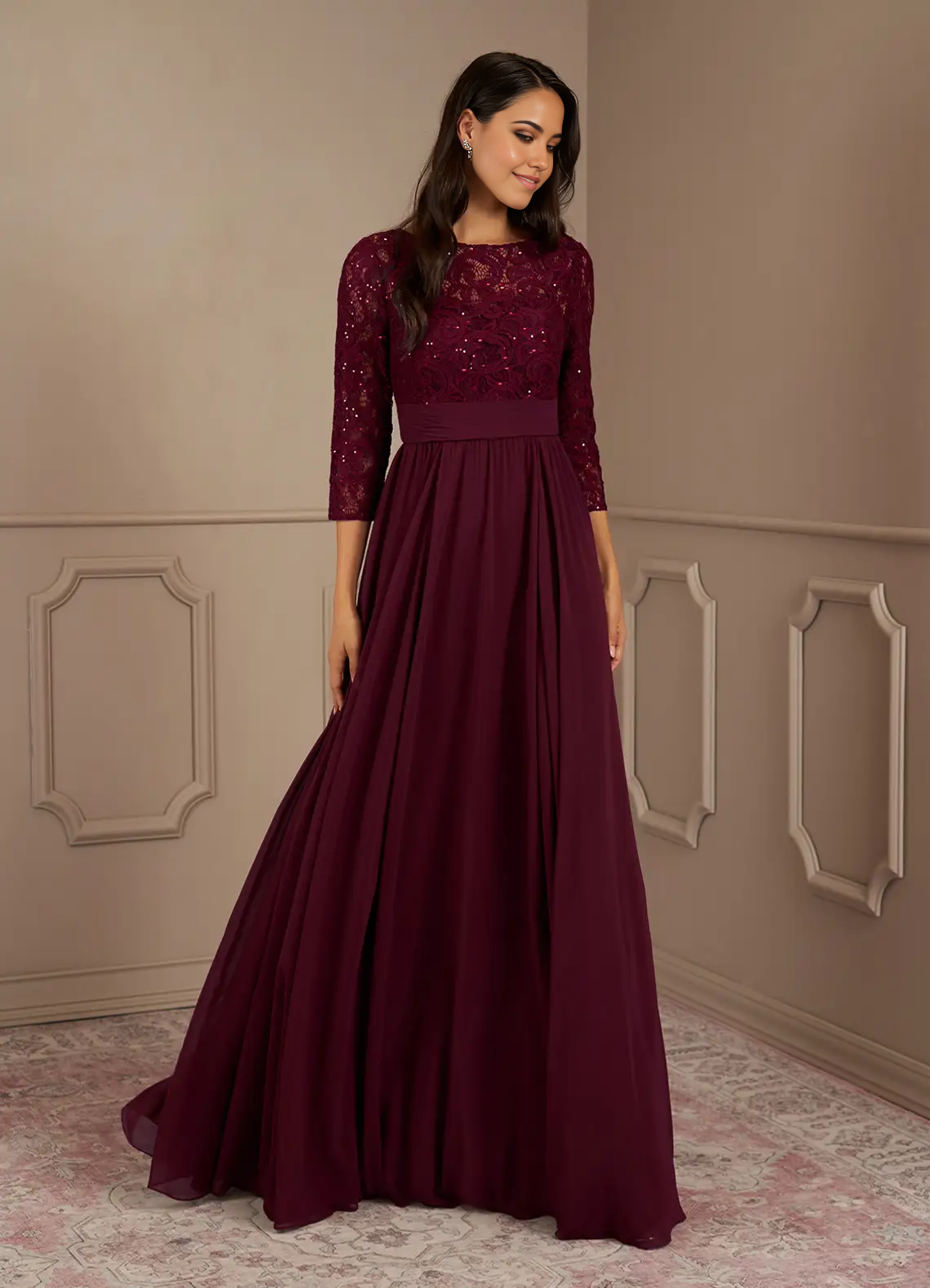 Woman wearing a long Cabernet A-Line sequin and chiffon formal dress with a V-neck.