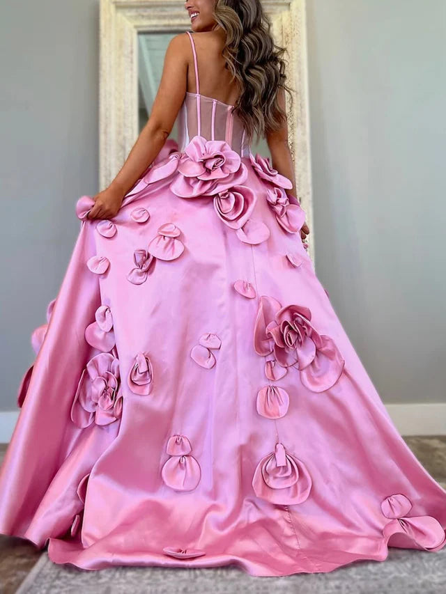 Front view of V-neck ball gown with handmade flower appliques.