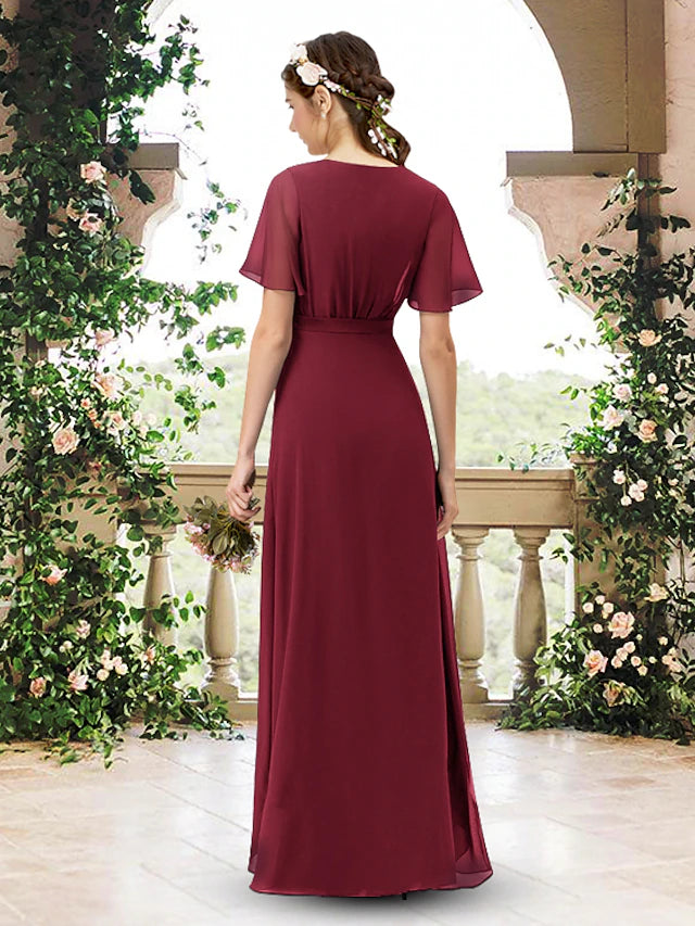 Back view of the A-line chiffon bridesmaid dress, showing pleats and flowy fabric.
