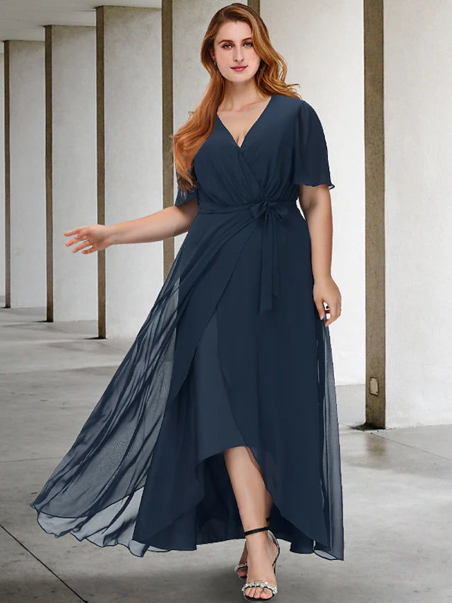 Plus size A-line Mother of the Bride dress with V-neck and short sleeves, featuring an asymmetrical hem and bow detail.
