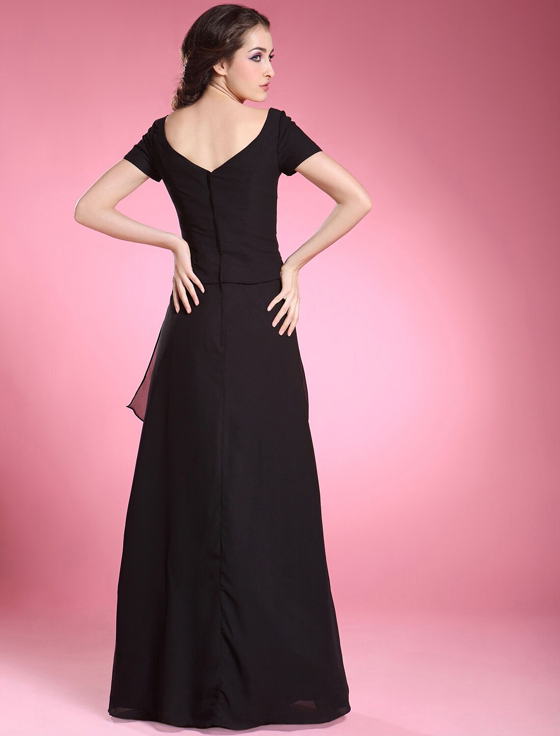 Back view of a formal A-Line chiffon dress featuring ruffles and a V-neck.