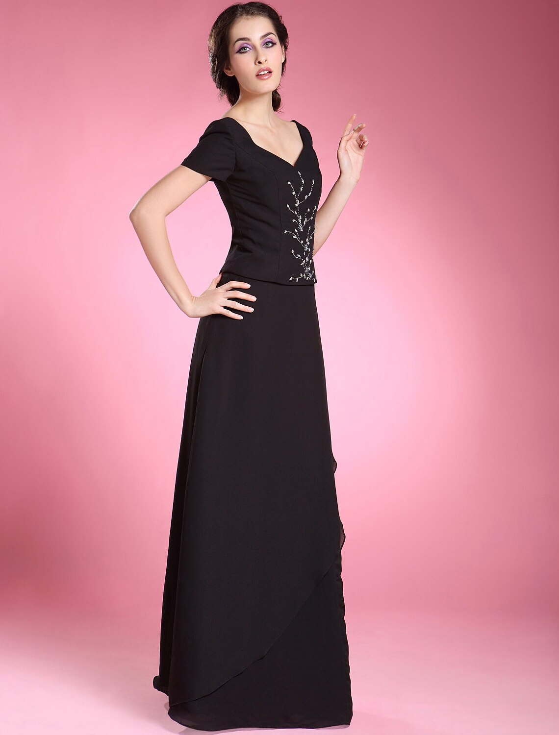 Side profile of a floor-length A-Line evening dress with delicate beading.