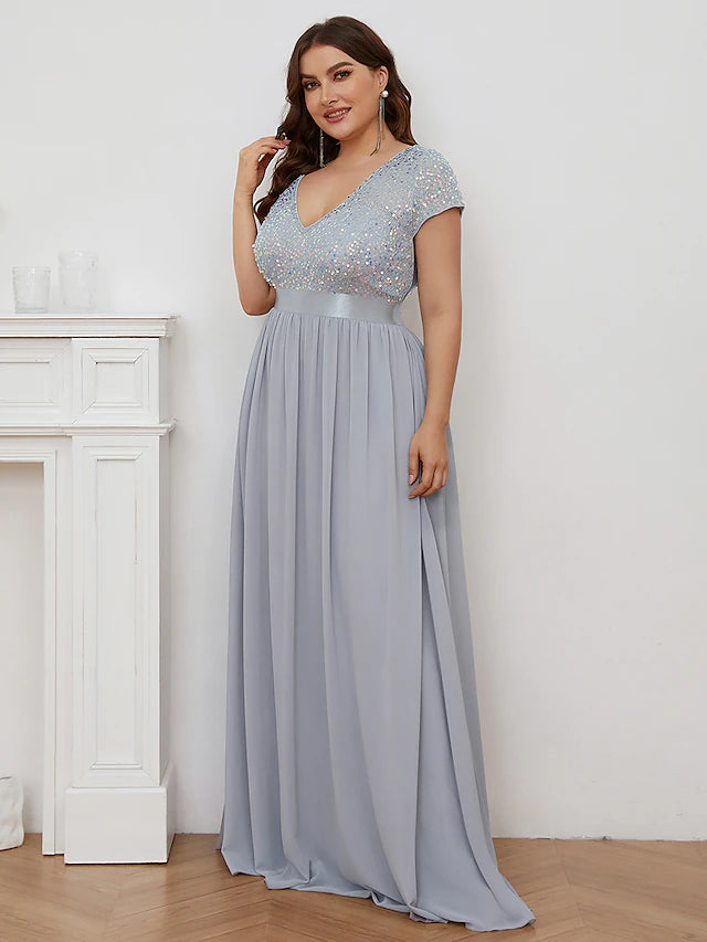 Side view of a floor-length chiffon bridesmaid dress with short sleeves.