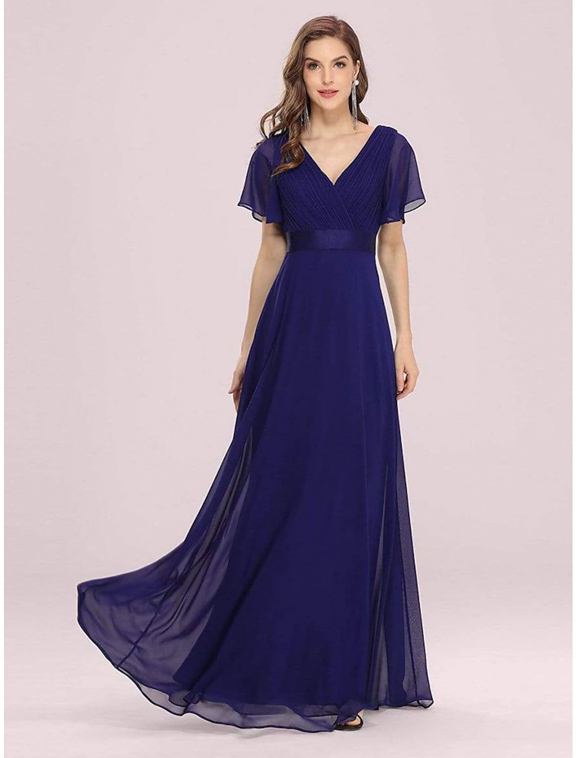 Elegant A-Line chiffon gown with V-neck and short sleeves.