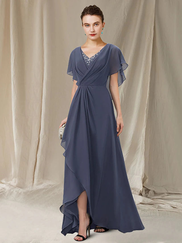 High-low hem Mother of the Bride dress with short sleeves and lace ruffles.
