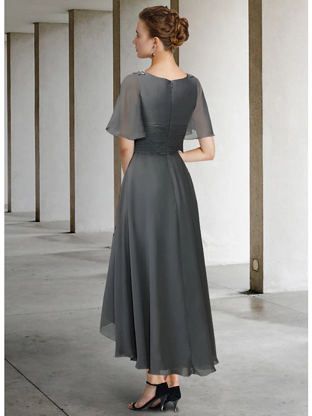 Side view of the elegant high-low mother of the bride dress with ruching.