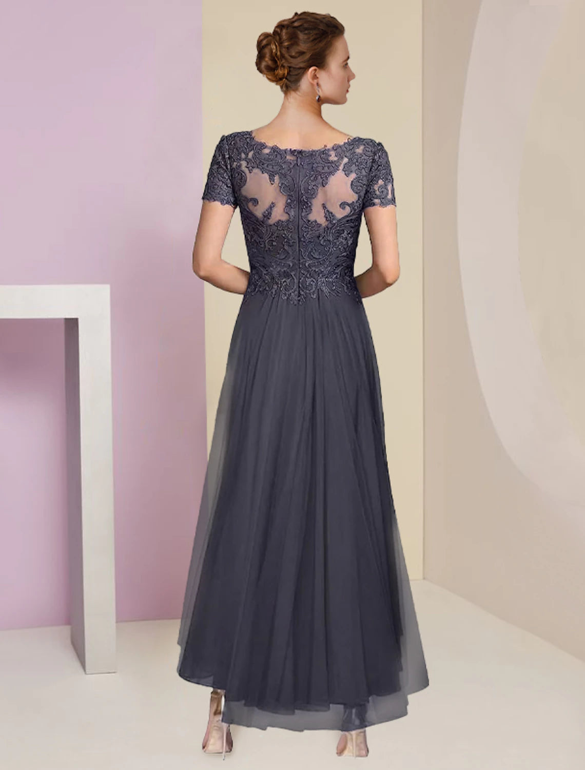Side view of the two-piece A-line V-neck dress, highlighting the asymmetrical tea-length skirt.