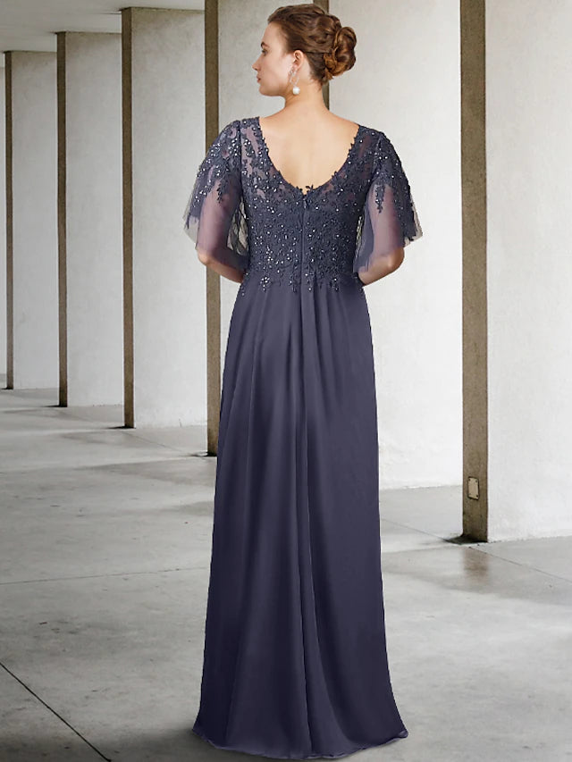 Back detail of floor-length mother of the bride dress with beading.