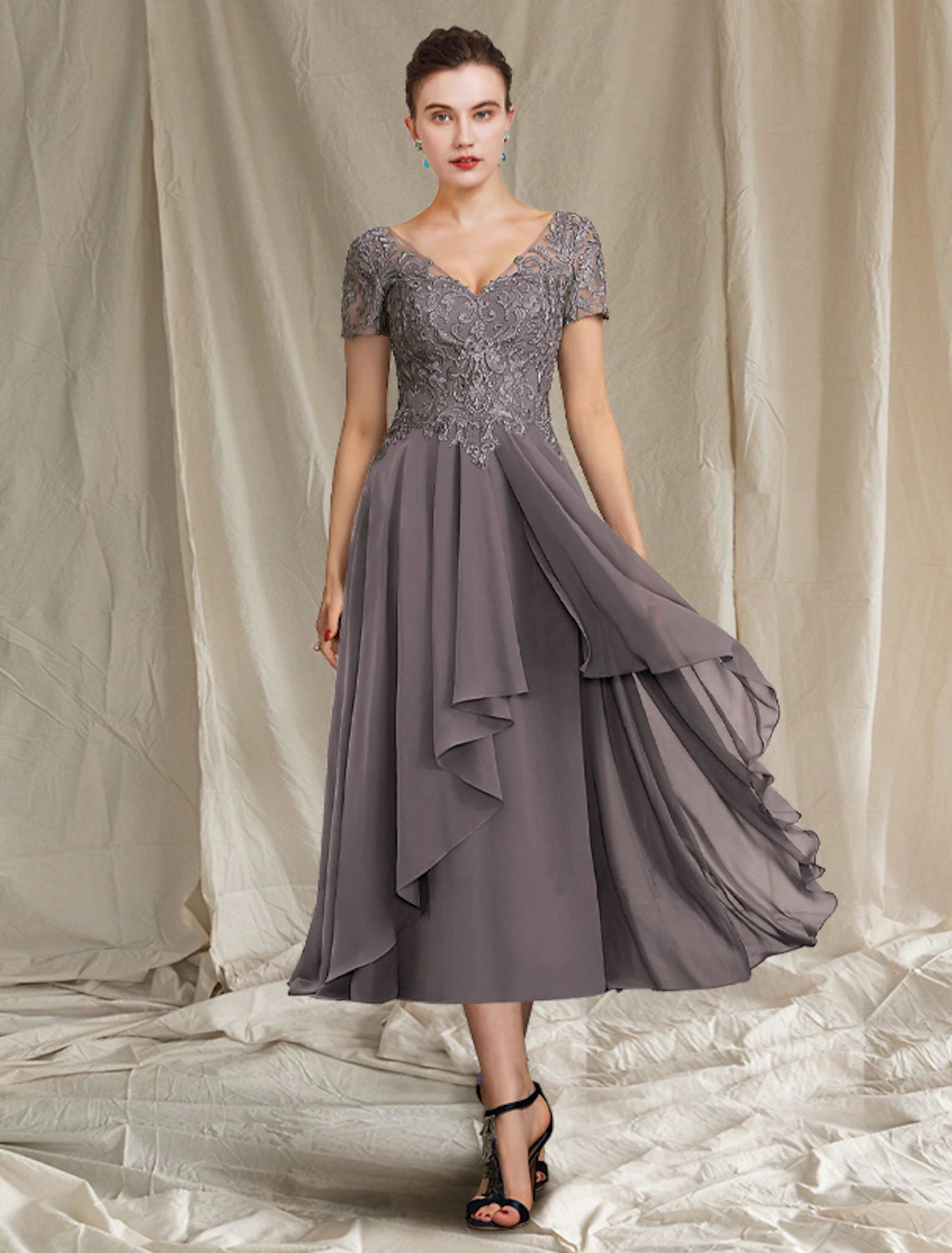 Front view of elegant A-Line V-neck Mother of the Bride dress.