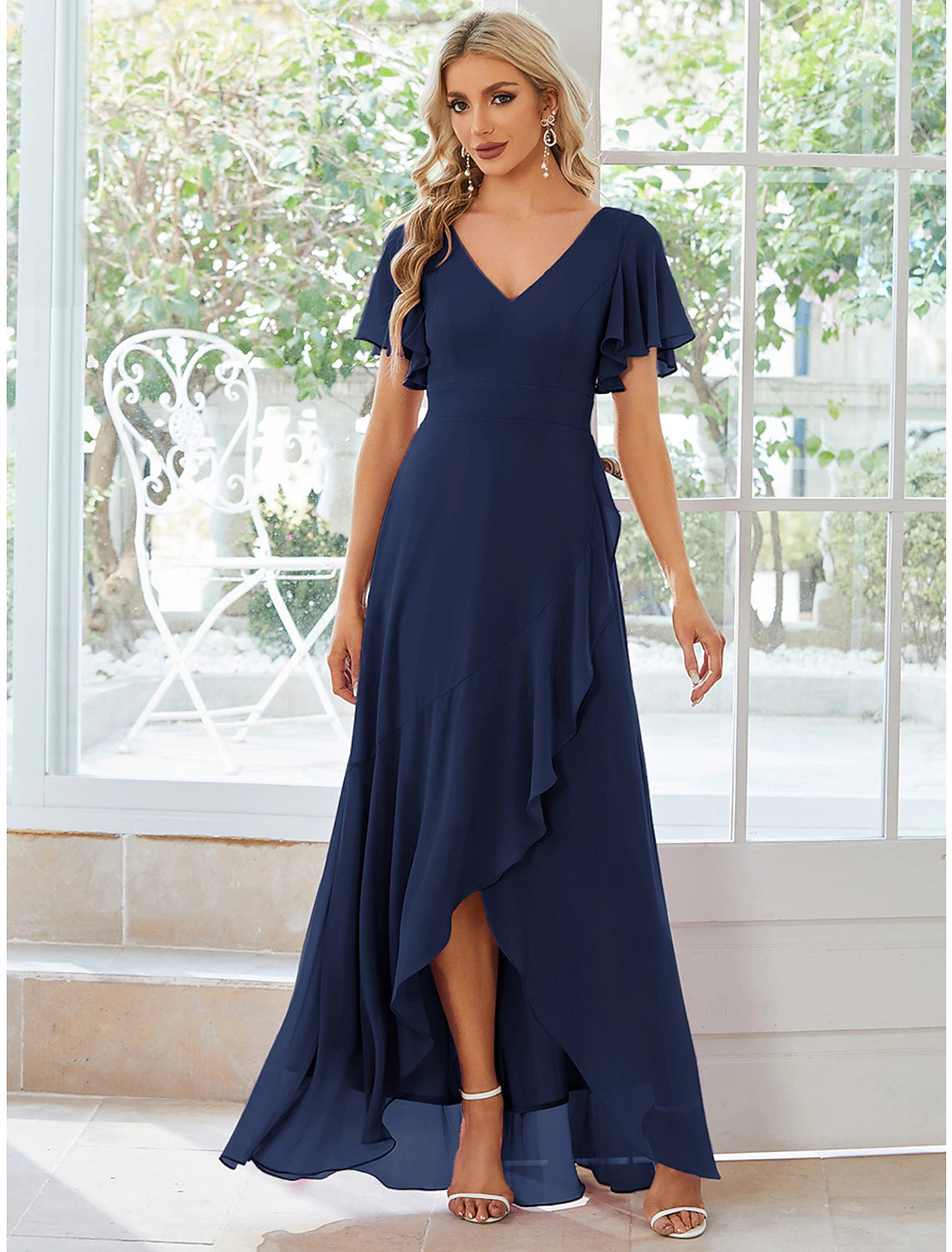 Elegant A-line chiffon dress with V-neck and short sleeves.