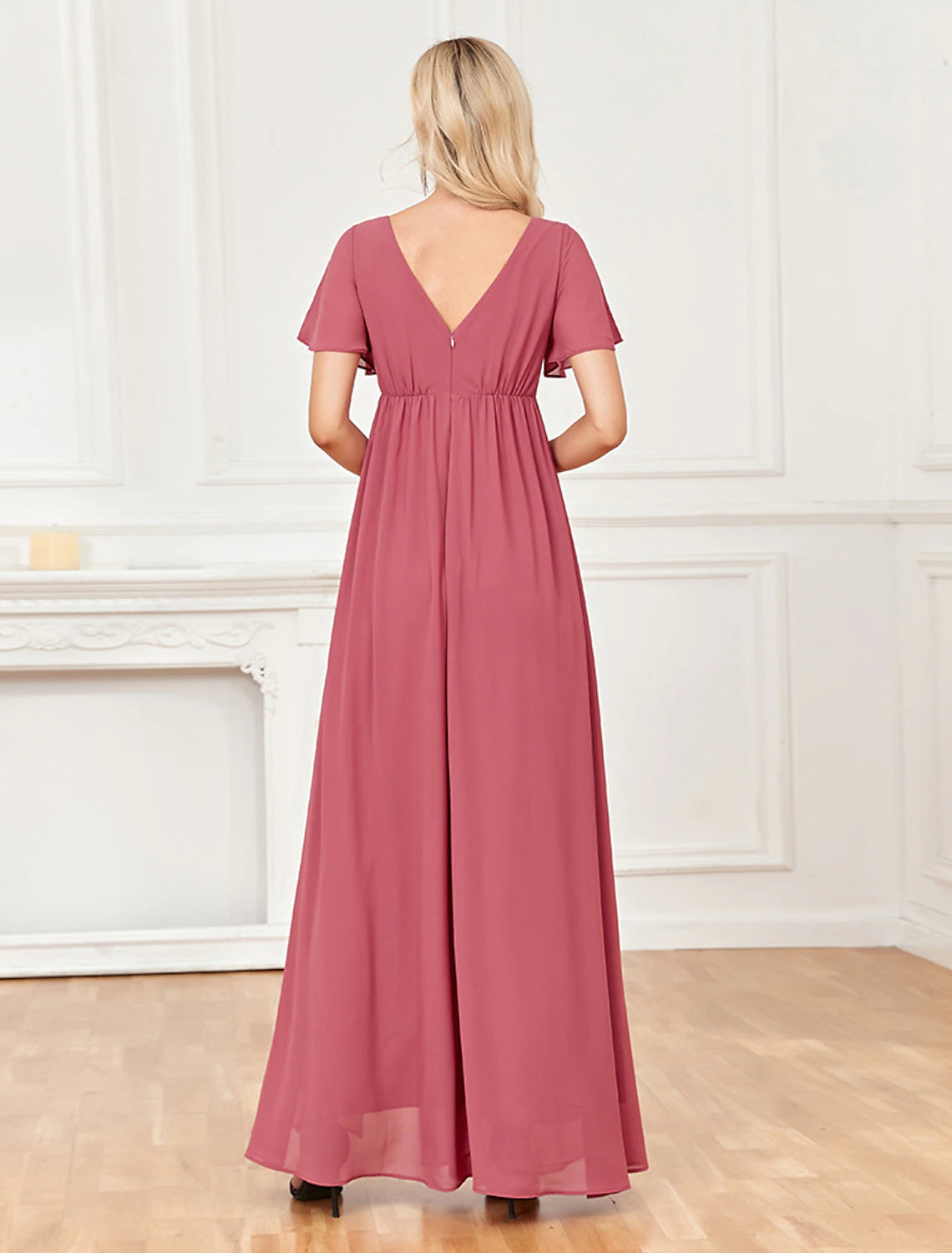 Detailed view of the slit on the floor-length A-line evening gown.