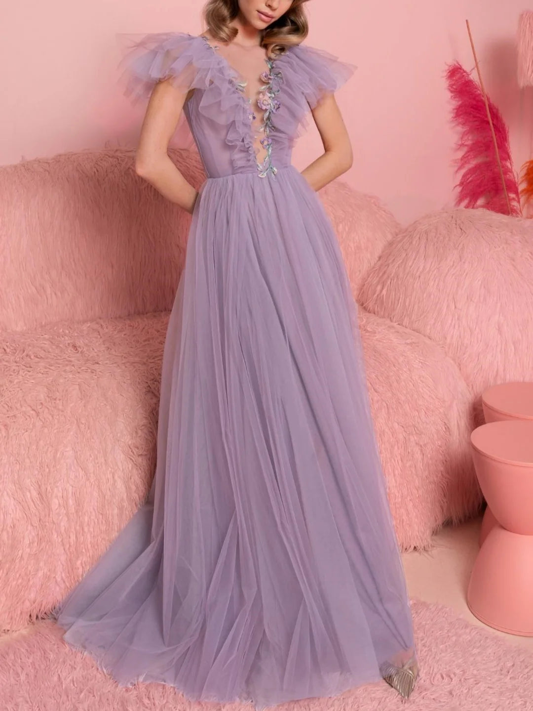 Elegant A-line V-neck short sleeve floor-length evening dress on a model.