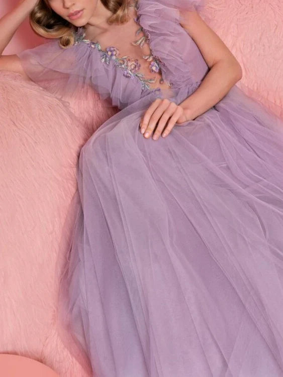 Back view of an A-line V-neck short sleeve floor-length formal dress.