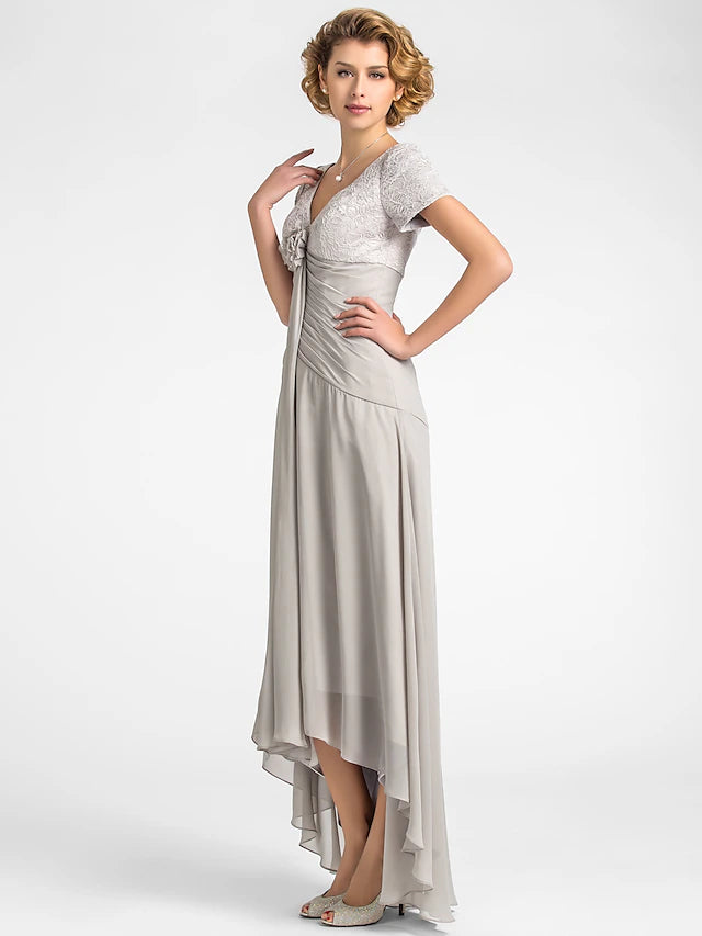 Back view of the elegant floral high-low mother of the bride dress, highlighting the flowing chiffon skirt.