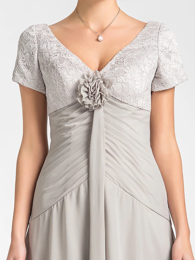 Close-up of the floral lace detail on the bodice of the A-line mother of the bride dress.